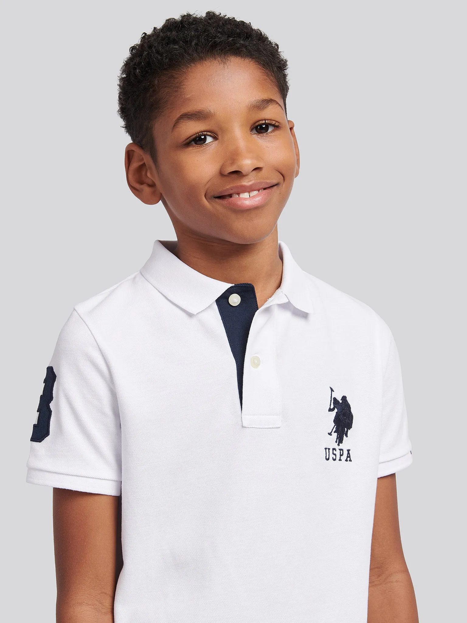 Boys Player 3 Polo Shirt in White / Dark Sapphire Navy DHM